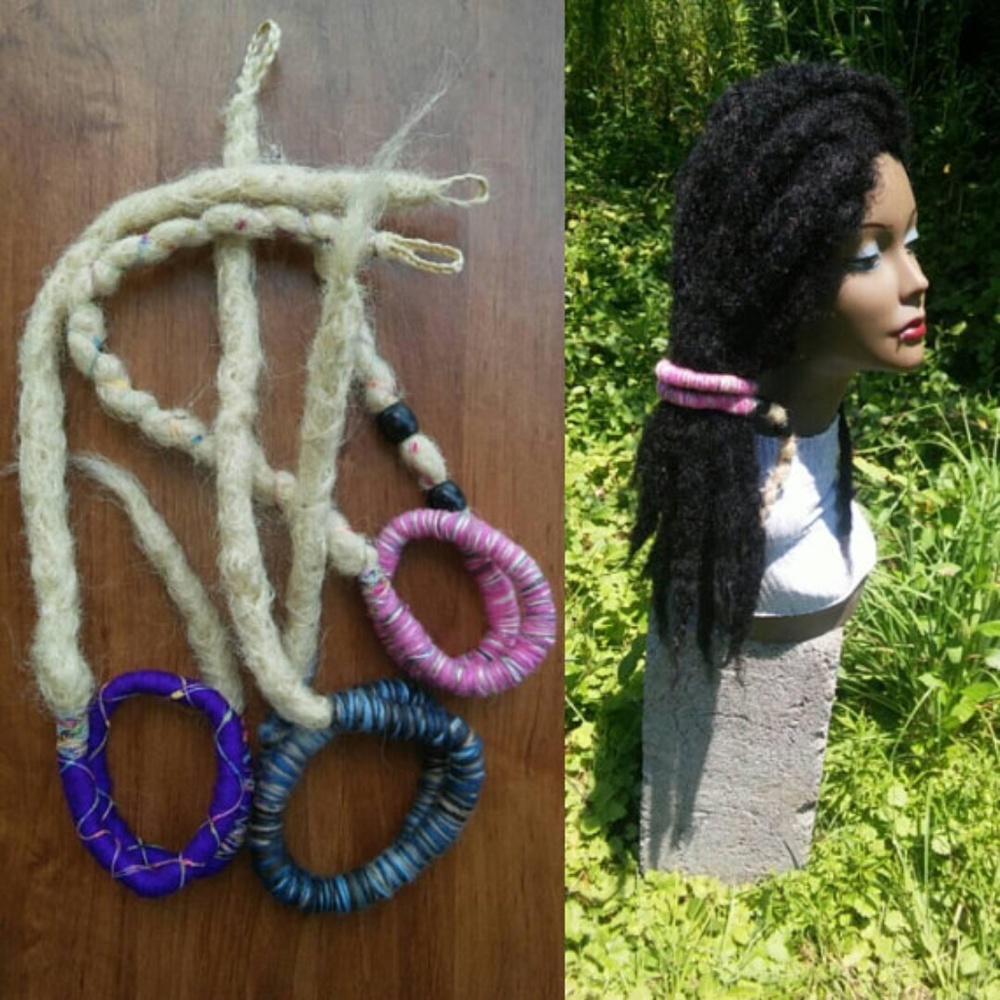 blonde dreadlock with bendable pink dread tie